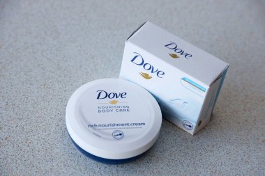 TERNOPIL, UKRAINE - APRIL 29, 2022: Production with Dove Logo on white textured surface