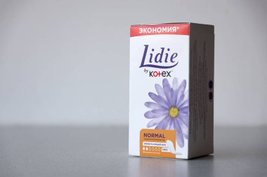 TERNOPIL, UKRAINE - APRIL 29, 2022: Kotex Lidie feminine pads box on white background surface