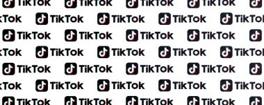 TERNOPIL, UKRAINE - MAY 2, 2022: Many TikTok logo printed on paper. Tiktok or Douyin is a famous Chinese short-form video hosting service owned by ByteDance Ltd clipart
