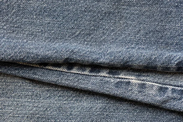 Detaillierte Abstrakte Textur Aus Dunkelblauem Denimstoff Hintergrundbild Alter Gebrauchter Jeanshosen — Stockfoto