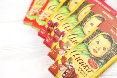 KHARKIV, UKRAINE - JANUARY 27, 2021: Alyonka chocolate square bars - product from Red October chocolate factory. Old russian traditional chocolate design