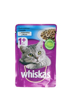 KHARKIV, UKRAINE - FEBRUARY 06, 2021: Whiskas branded cat pet food purple package on white background. Whiskas is a global brand of cat food produced by the American company Mars, Inc