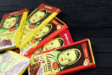 KHARKIV, UKRAINE - JANUARY 27, 2021: Alyonka chocolate square bars - product from Red October chocolate factory. Old russian traditional chocolate design