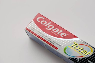 TERNOPIL, UKRAINE - JUNE 23, 2022: Colgate toothpaste, a brand of oral hygiene products manufactured by American consumer-goods company Colgate-Palmolive headquartered on NYC