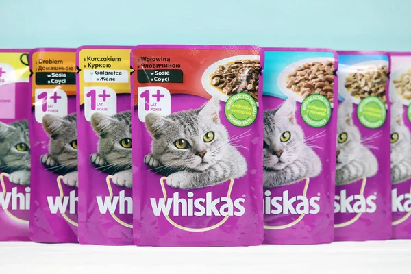 stock image KHARKIV, UKRAINE - FEBRUARY 06, 2021: Whiskas branded cat pet food purple packages close up. Whiskas is a global brand of cat food produced by the American company Mars, Inc