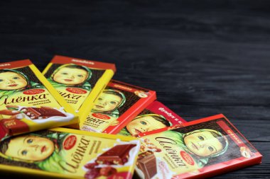 KHARKIV, UKRAINE - JANUARY 27, 2021: Alyonka chocolate square bars - product from Red October chocolate factory. Old russian traditional chocolate design