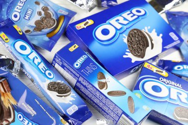 KHARKIV, UKRAINE - FEBRUARY 14, 2021: Oreo original and thins crispy cookies packs. The brand Oreo is owned by american company Mondelez international