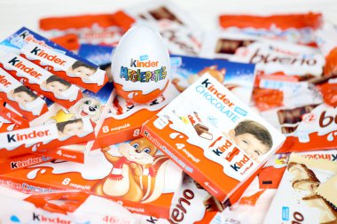 KHARKIV, UKRAINE - FEBRUARY 14, 2021: Kinder Chocolate various production. Kinder is a confectionery product brand line of Italian multinational confectionery Ferrero.
