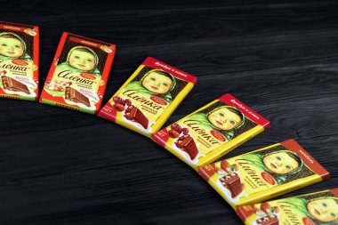KHARKIV, UKRAINE - JANUARY 27, 2021: Alyonka chocolate square bars - product from Red October chocolate factory. Old russian traditional chocolate design