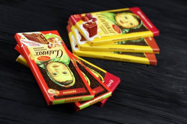 KHARKIV, UKRAINE - JANUARY 27, 2021: Alyonka chocolate square bars - product from Red October chocolate factory. Old russian traditional chocolate design