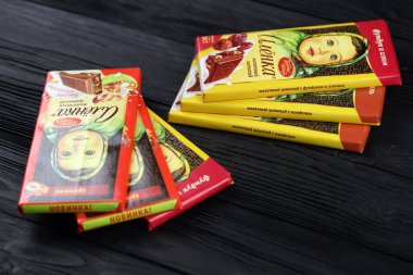 KHARKIV, UKRAINE - JANUARY 27, 2021: Alyonka chocolate square bars - product from Red October chocolate factory. Old russian traditional chocolate design