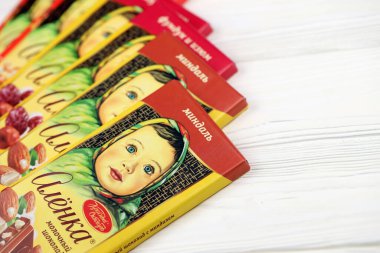 KHARKIV, UKRAINE - JANUARY 27, 2021: Alyonka chocolate square bars - product from Red October chocolate factory. Old russian traditional chocolate design