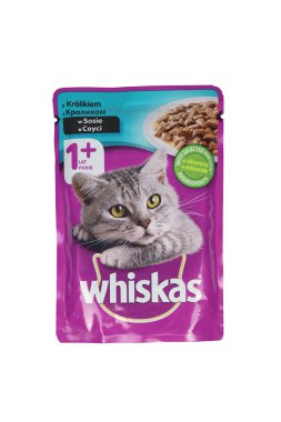 KHARKIV, UKRAINE - FEBRUARY 06, 2021: Whiskas branded cat pet food purple package on white background. Whiskas is a global brand of cat food produced by the American company Mars, Inc