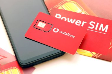 TERNOPIL, UKRAINE - JULY 5, 2022: Vodafone Power SIM mobile card by Vodafone group plc - British multinational telecommunications company who owns and operates networks in 22 countries