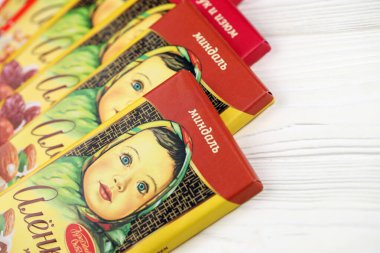 KHARKIV, UKRAINE - JANUARY 27, 2021: Alyonka chocolate square bars - product from Red October chocolate factory. Old russian traditional chocolate design