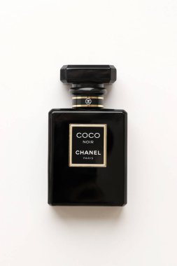 TERNOPIL, UKRAINE - SEPTEMBER 2, 2022 Chanel Coco Noir worldwide famous french perfume bottle on white paper background
