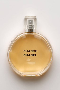TERNOPIL, UKRAINE - SEPTEMBER 2, 2022 Chanel Chance worldwide famous french perfume bottle on white paper background