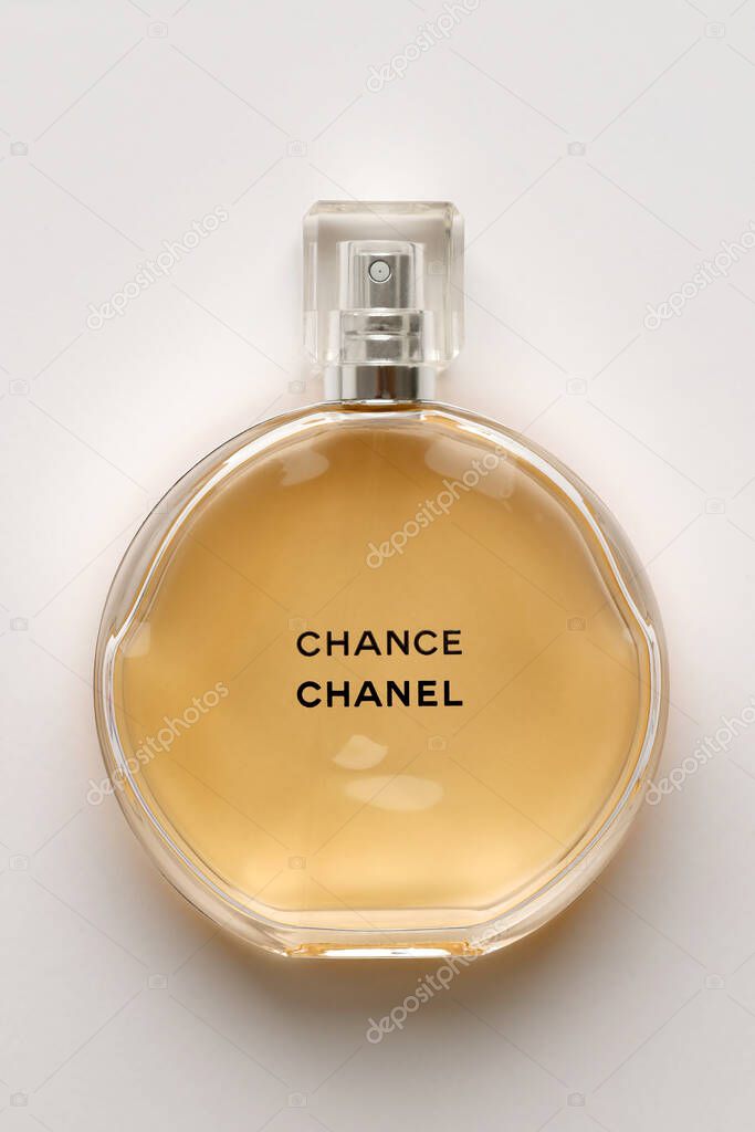 TERNOPIL, UKRAINE - SEPTEMBER 2, 2022 Chanel Chance worldwide famous french perfume bottle on white paper background