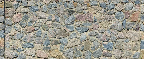 Текстура Каменной Стены Множеством Больших Коричневых Серых Камней Вооруженных Цементом — стоковое фото