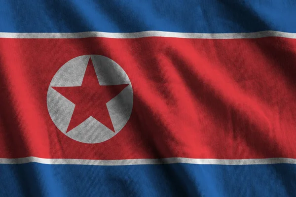 Bandeira Coreia Norte Com Grandes Dobras Acenando Perto Sob Luz — Fotografia de Stock