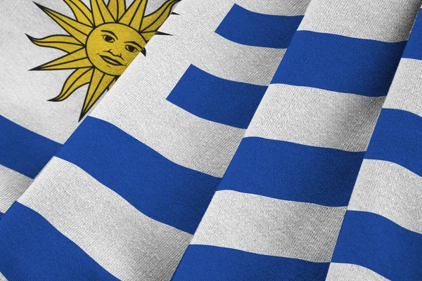 Bandera Uruguay Con Grandes Pliegues Ondeando Cerca Bajo Luz Del —  Fotos de Stock