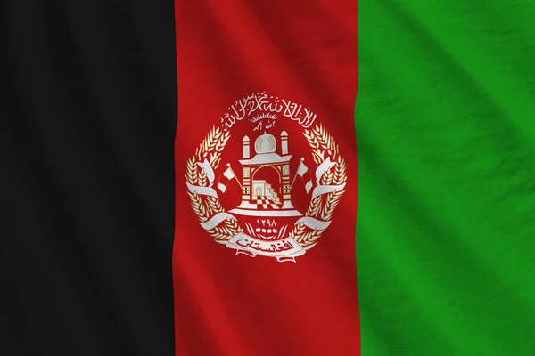 stock image Afghanistan flag with big folds waving close up under the studio light indoors. The official symbols and colors in fabric banner