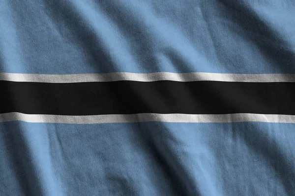 Bandiera Botswana Con Grandi Pieghe Che Sventolano Vicino Sotto Luce — Foto Stock