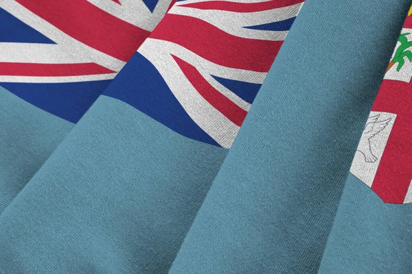 피지에서는 아래에서 접히고 흔들면서 깃발을 그린다 천으로만든 상징물 — 스톡 사진