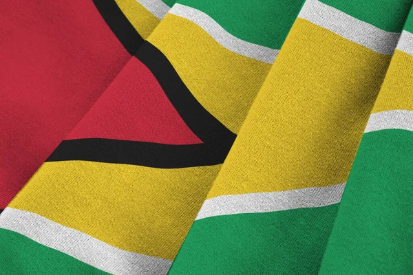 Bandiera Guyana Con Grandi Pieghe Che Sventolano Vicino Sotto Luce — Foto Stock