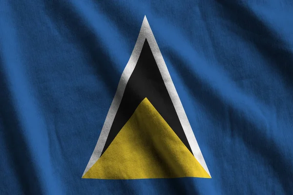 Flaga Saint Lucia Dużymi Fałdami Machająca Bliska Pod Światłem Studyjnym — Zdjęcie stockowe