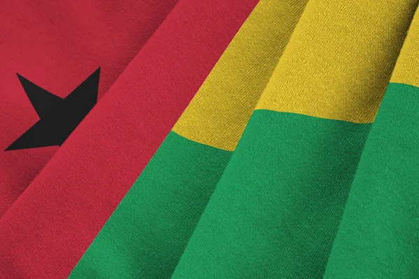 Bandiera Guinea Bissau Con Grandi Pieghe Sventolando Vicino Sotto Luce — Foto Stock