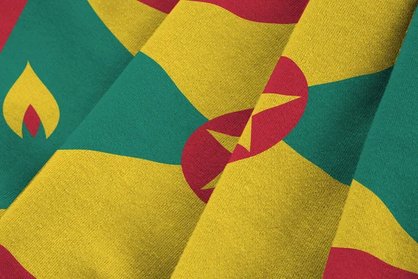 Bandiera Grenada Con Grandi Pieghe Sventolando Vicino Sotto Luce Dello — Foto Stock