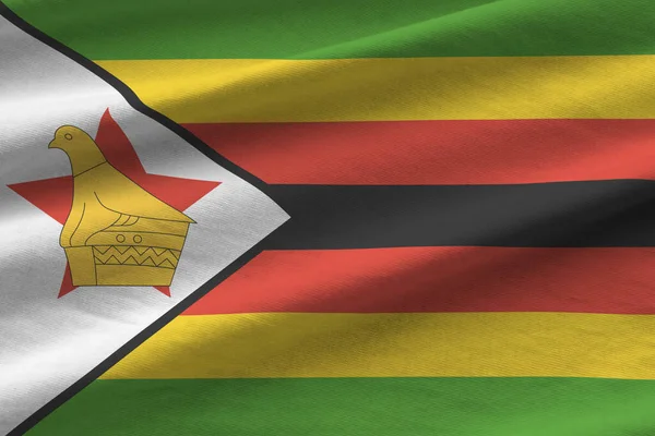 Zimbabwe Bandiera Con Grandi Pieghe Sventolando Vicino Sotto Luce Studio — Foto Stock