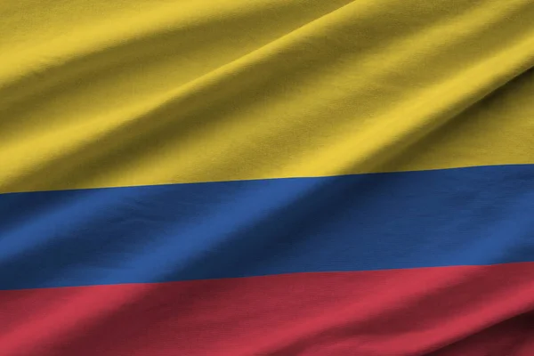 Colombia Vlag Met Grote Plooien Zwaaien Close Onder Studio Licht — Stockfoto