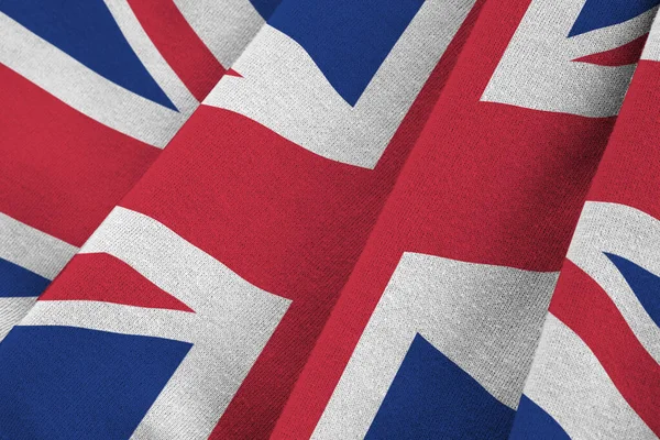 Wielka Brytyjska Flaga Dużymi Fałdami Machająca Bliska Pod Światłem Studyjnym — Zdjęcie stockowe