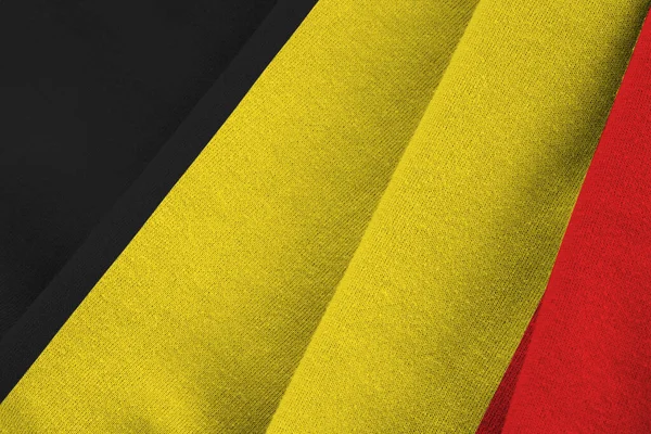 Σημαία Βελγίου Μεγάλες Πτυχές Κυματίζει Κοντά Κάτω Από Φως Στούντιο — Φωτογραφία Αρχείου