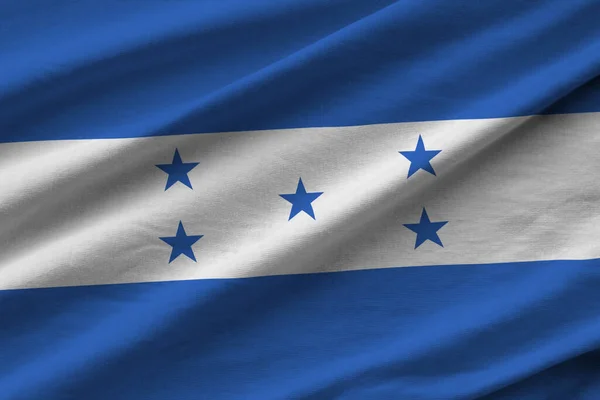 Bandera Honduras Con Grandes Pliegues Ondeando Cerca Bajo Luz Del —  Fotos de Stock