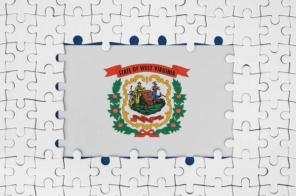 West Virginia US state flag in frame of white puzzle pieces with missing central parts