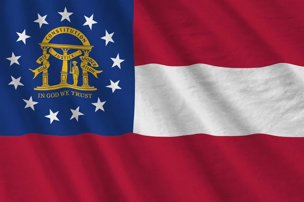 Georgia US state flag with big folds waving close up under the studio light indoors. The official symbols and colors in fabric banner