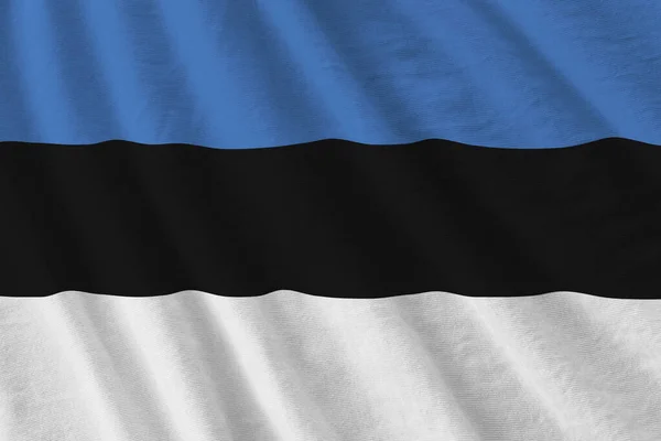 Estonia Bandiera Con Grandi Pieghe Sventolando Vicino Sotto Luce Studio — Foto Stock