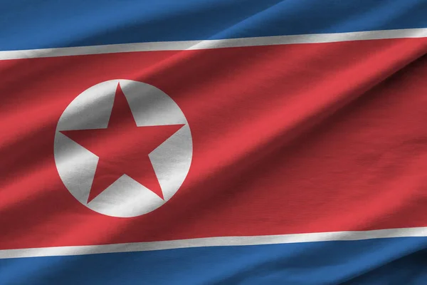 Bandeira Coreia Norte Com Grandes Dobras Acenando Perto Sob Luz — Fotografia de Stock