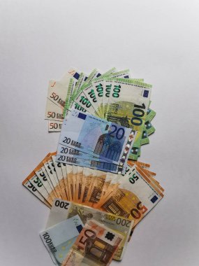 Euro paper banknotes on a white background