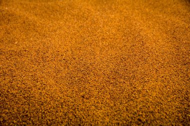 Arkaplan resmi, küçük taşlar, kum.