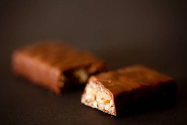 Çikolata ve parçalar. Hala ayrıntı. Yüksek kalite fotokopi çubukları ve parçalar. 