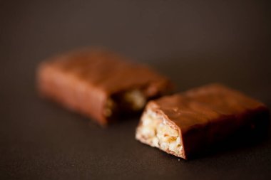 Çikolata ve parçalar. Hala ayrıntı. Yüksek kalite fotokopi çubukları ve parçalar. 