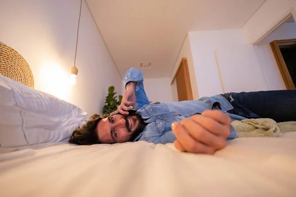 Side View Young Man Using Smartphone Night Time His Bedroom — Stock Photo, Image
