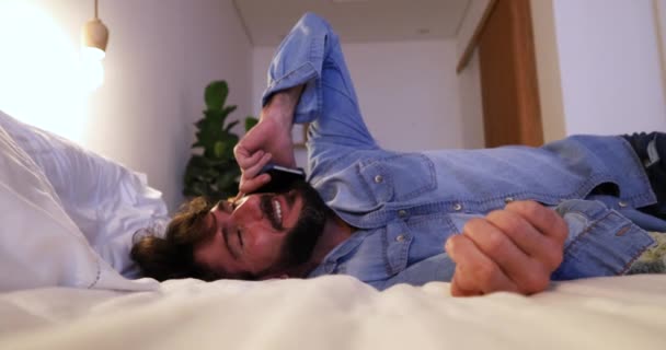 Side View Young Man Using Smartphone Nighttime His Bed — Stock Video