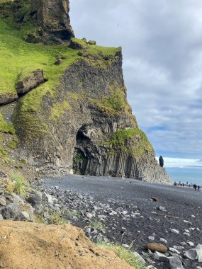 A Cave with Basalt Columns on a Beach in Iceland