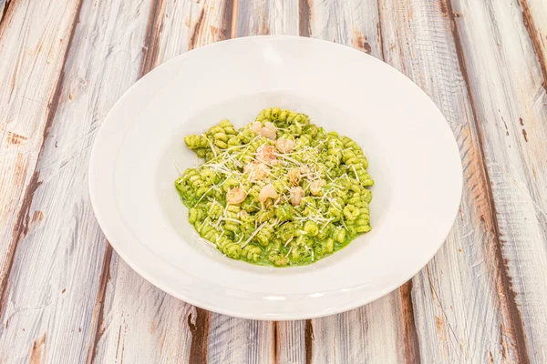traditional pesto fusilli pasta recipe with pesto sauce, a classic of Italian cuisine, ideal with our Fusilli, enjoy it with your family and guests