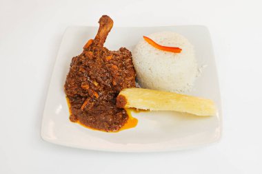 Aji de gallina with fried yucca rice.